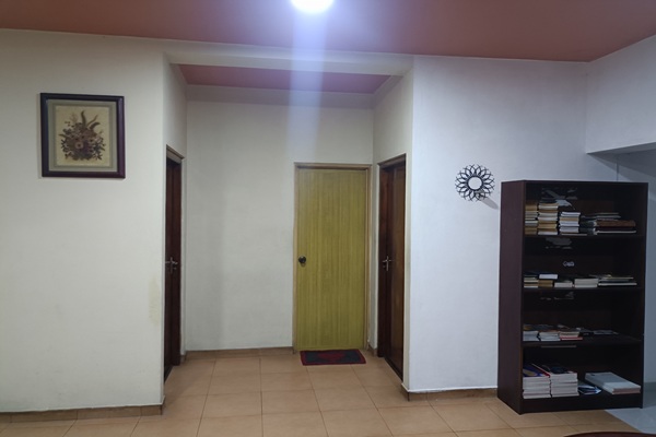 Entrance to queen rooms and common toilet